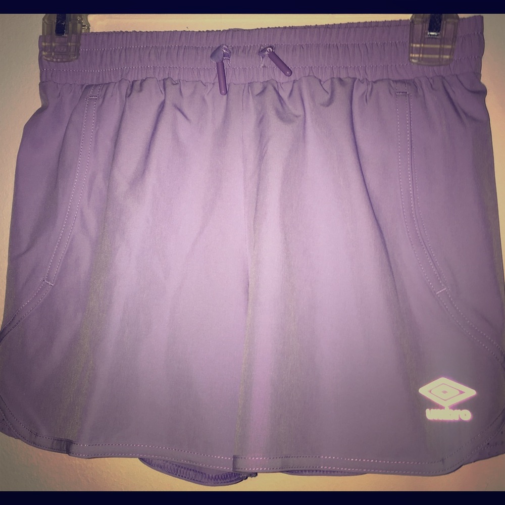I am selling lavender and white sports shorts.